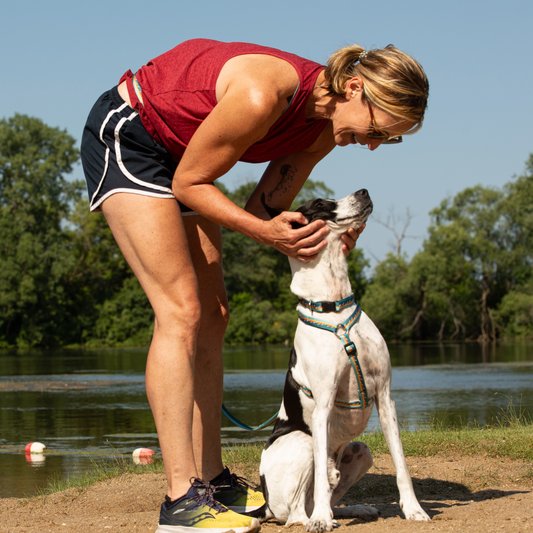 Dog mom walking stress-free with Luwello’s no-pull harness and belted tether leash.