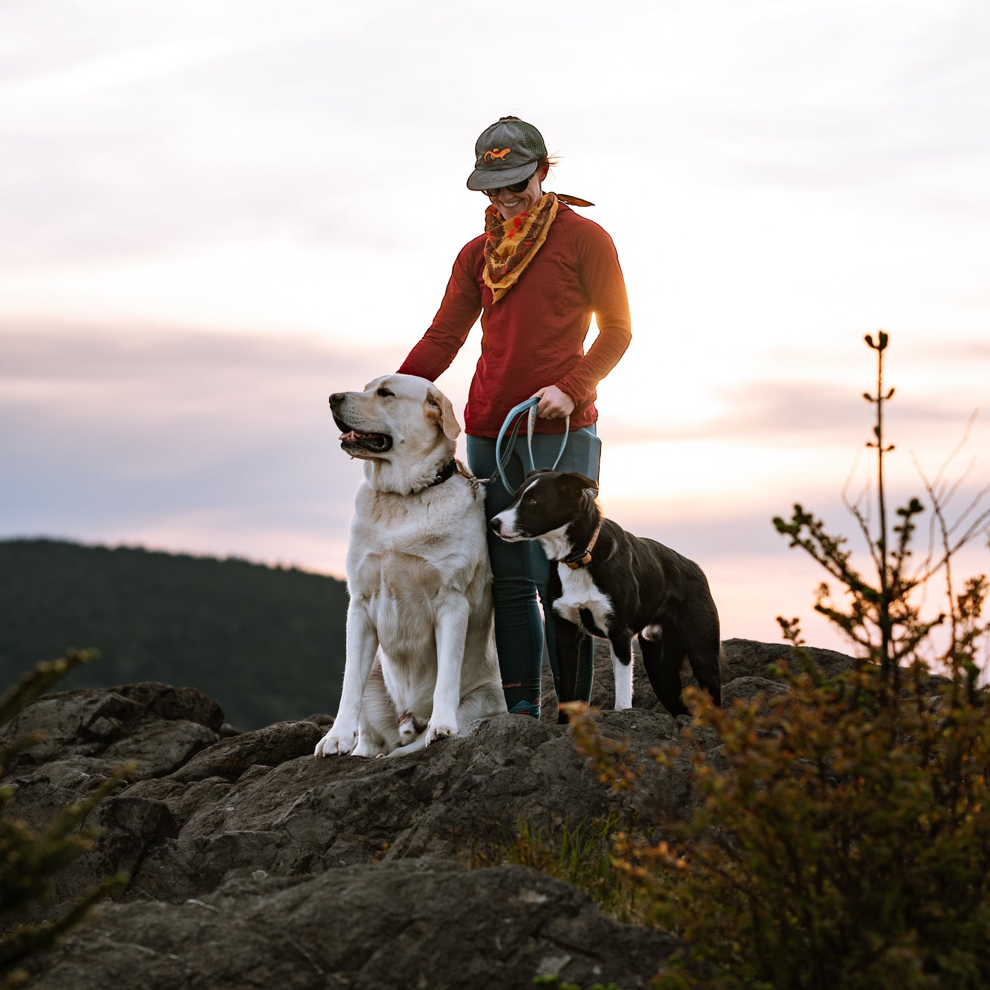 Woman hiking with two dog leash coupler hands free